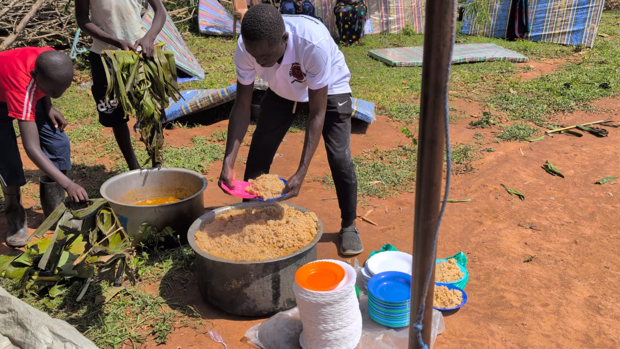 Food being served during the Easter community meal in Uganda.