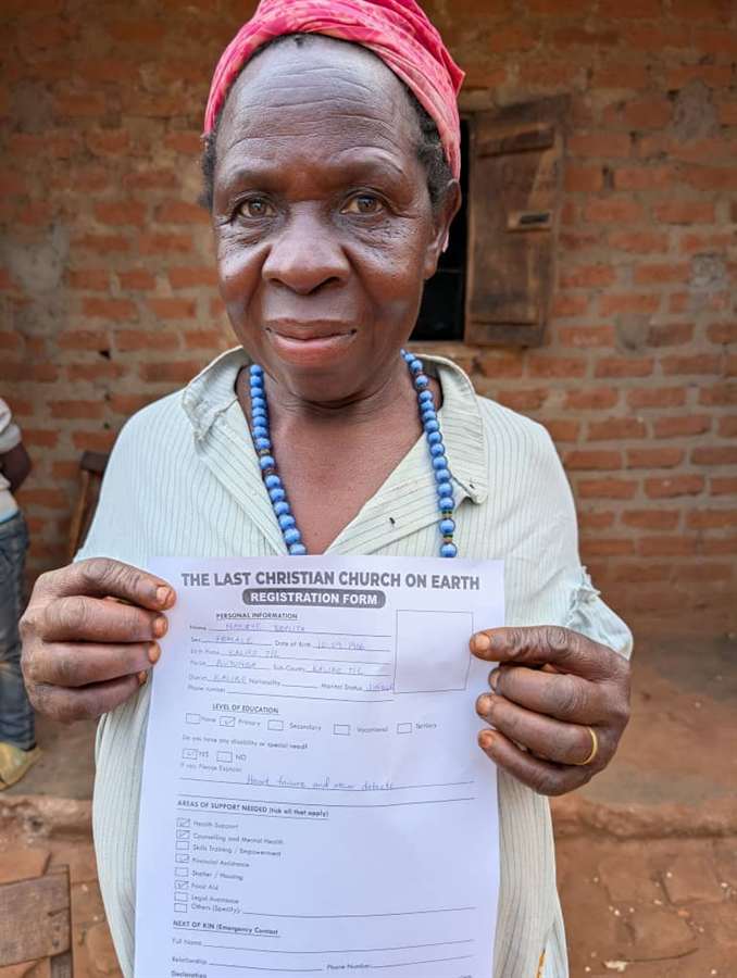 A woman standing in a doorway holding a signed request form.